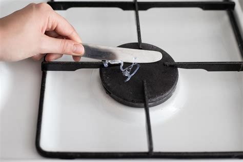 how to remove melted plastic from gas burner